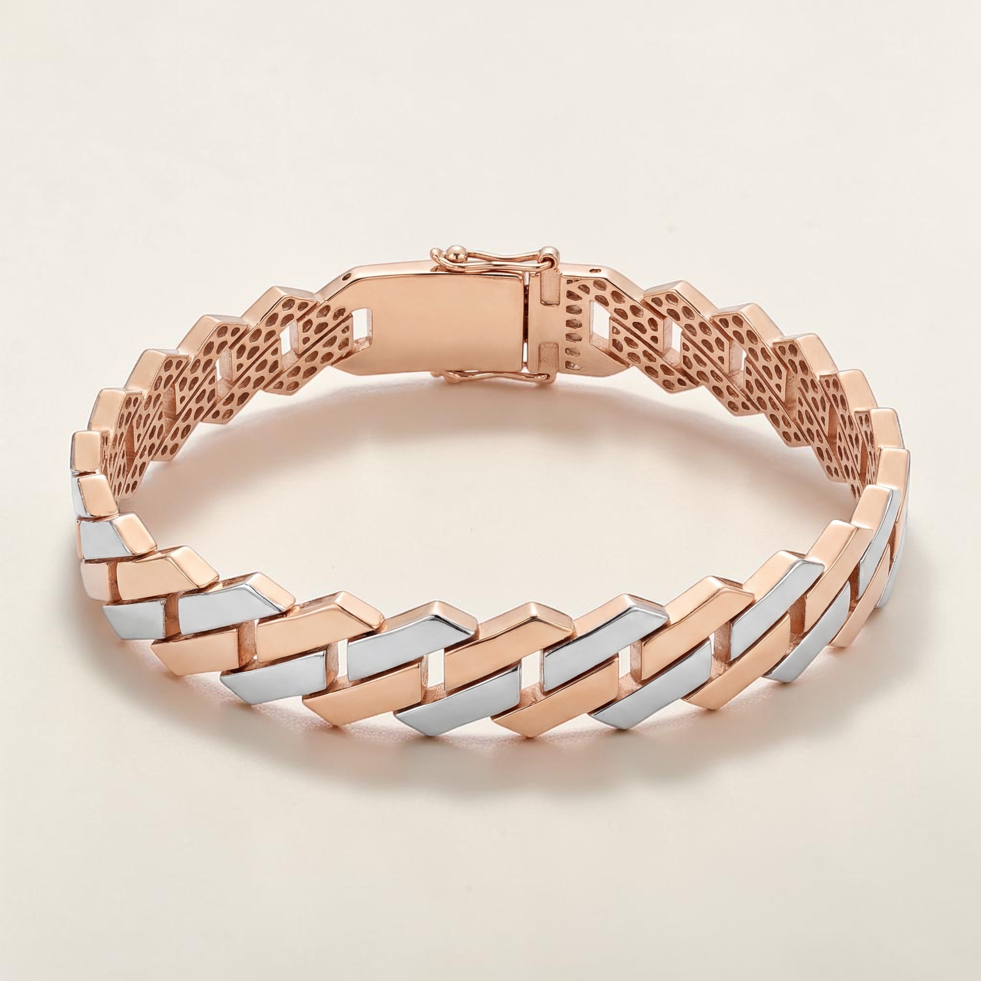 Modern 18K rose gold dual-tone bracelet featuring interlocking geometric links with white gold accents and a secure box clasp. Contemporary luxury bracelet by Pachchigar Jewellers.