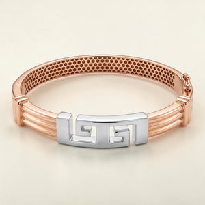 Elegant 18K rose gold dual-tone kada featuring a polished white gold Greek key centerpiece, multi-band design, and secure clasp. Contemporary luxury bracelet by Pachchigar Jewellers.