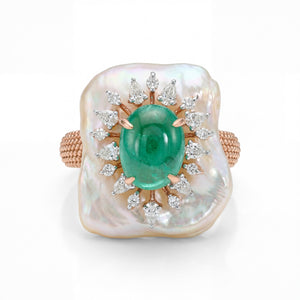 Luxurious 18K rose gold emerald mother of pearl statement ring featuring natural mother of pearl face with oval emerald center and marquise diamond sunburst halo by Pachchigar Jewellers Ashokbhai