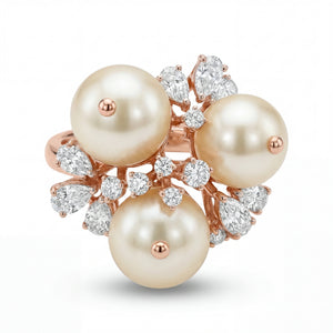 Elegant 18K rose gold pearl diamond floral statement ring featuring three round pearls with marquise and round diamond cluster detailing by Pachchigar Jewellers Ashokbhai