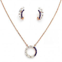 Elegant 18K rose gold jewelry set featuring a circular pendant necklace with blue enamel and marquise diamond accents, paired with matching hoop earrings.