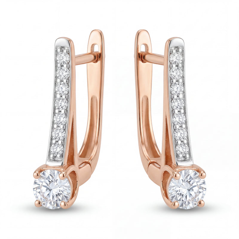 Stylish 18K rose gold drop earrings with brilliant round diamonds and sparkling linear diamond setting crafted by Pachchigar Jewellers Ashokbhai