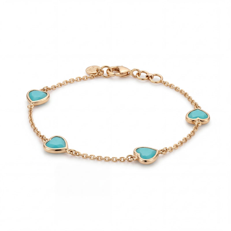Elegant 18K rose gold bracelet featuring turquoise heart-shaped bezel set stones on a delicate chain design by Pachchigar Jewellers Ashokbhai