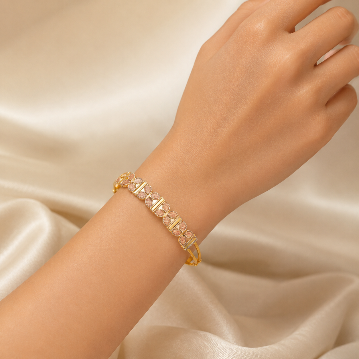 Elegant 18K yellow gold designer bracelet featuring alternating pavé diamond oval motifs, polished gold bar links, geometric detailing, and a sleek contemporary open design. Luxury diamond bracelet by Pachchigar Jewellers.
