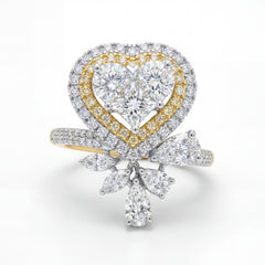 Elegant 18K yellow gold diamond heart bow statement ring featuring heart shaped center cluster with pavé halo and pear diamond accents by Pachchigar Jewellers Ashokbhai
