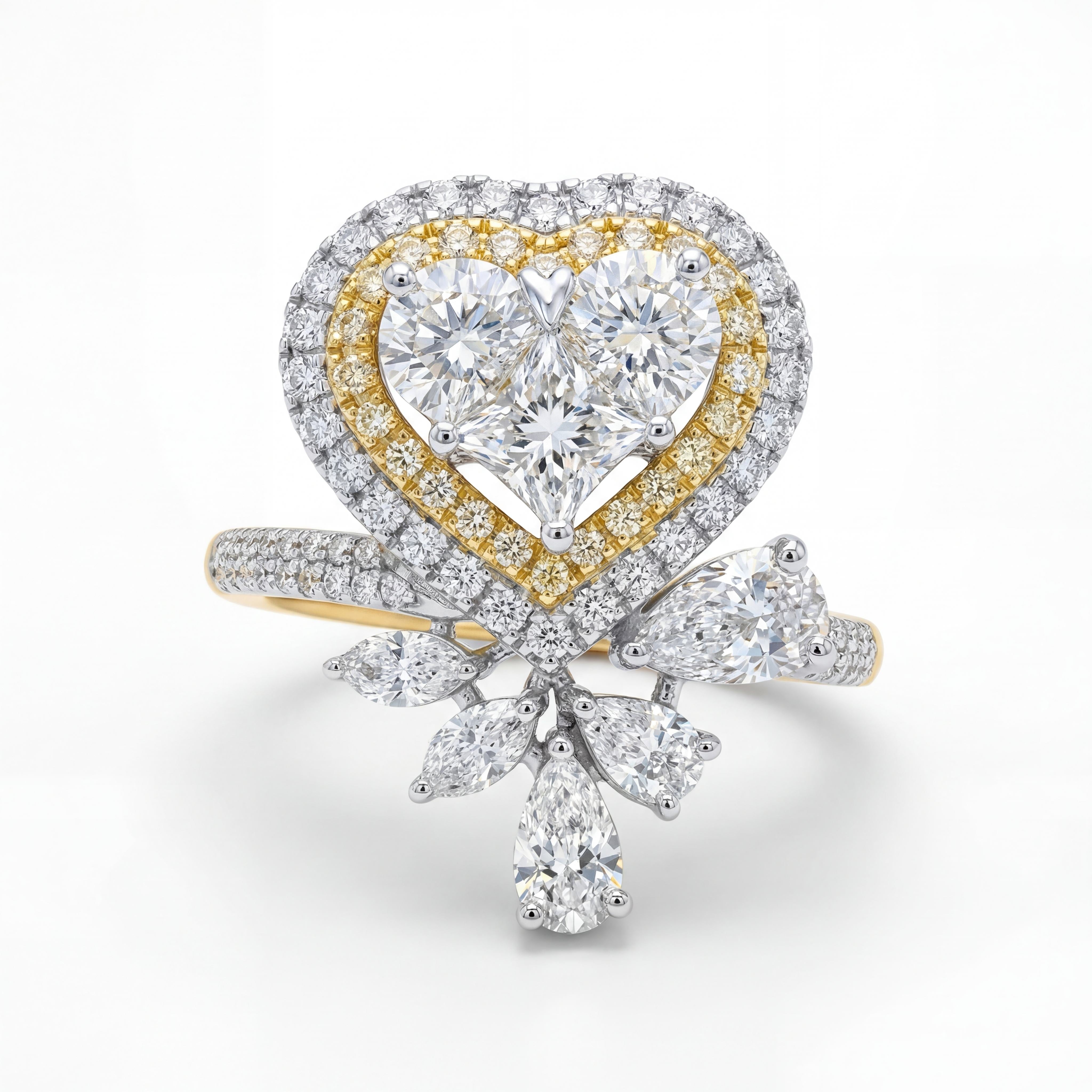 Elegant 18K yellow gold diamond heart bow statement ring featuring heart shaped center cluster with pavé halo and pear diamond accents by Pachchigar Jewellers Ashokbhai