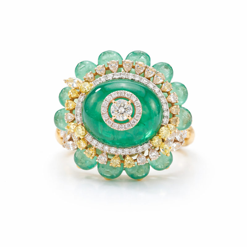 Elegant 18K yellow gold emerald diamond floral cocktail ring featuring oval cabochon emerald center with diamond halo and carved emerald bead petals by Pachchigar Jewellers Ashokbhai