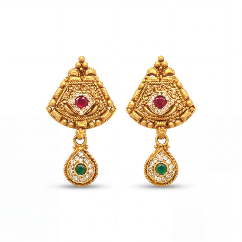 Elegant 22KT yellow gold antique earrings featuring ruby center stones, emerald drop motifs, and intricate traditional detailing on a white background.