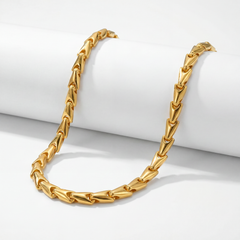 22KT BIS Hallmarked gold chevron link chain featuring sleek V-shaped interlocking links with a high-polish yellow gold finish. A bold contemporary designer gold chain for men, ideal for everyday wear, festive occasions, and gifting from Pachchigar Jewellers.