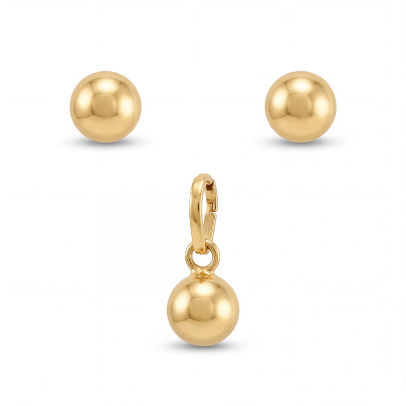 Minimalist 22KT yellow gold pendant set featuring polished gold ball pendant with matching round stud earrings on a white background.