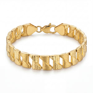 Bold 22KT gold bracelet featuring textured geometric links with polished accents on a white background.