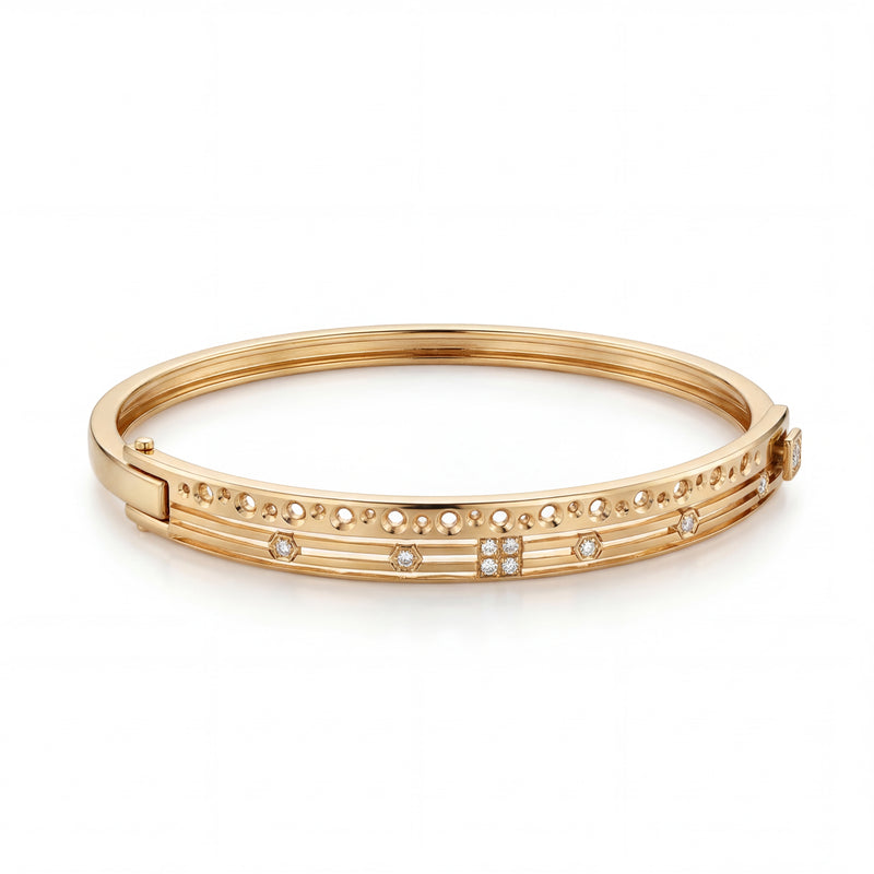 Elegant 22KT gold kada bracelet featuring delicate diamond accents with openwork detailing on a white background.
