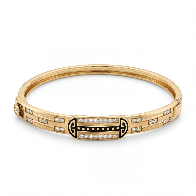 Elegant 22KT gold kada bracelet featuring black enamel centerpiece with sparkling diamond accents on a white background.