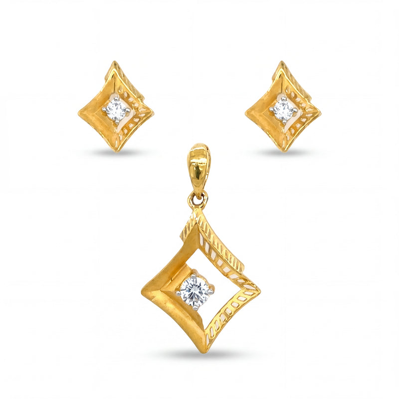 Stylish 22KT yellow gold pendant set featuring geometric diamond-shaped pendant with solitaire accents and matching stud earrings on a white background.
