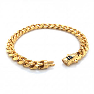 Bold 22KT gold bracelet featuring classic Cuban curb chain links with polished finish and secure clasp on a white background.