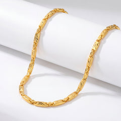 Stylish 22K yellow gold designer chain necklace featuring dual-texture elongated links with intricate detailing displayed on a white cylindrical stand.