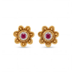 Traditional 22K yellow gold flower shape earrings with red ruby centerpiece and detailed textured petals crafted by Pachchigar Jewellers Ashokbhai