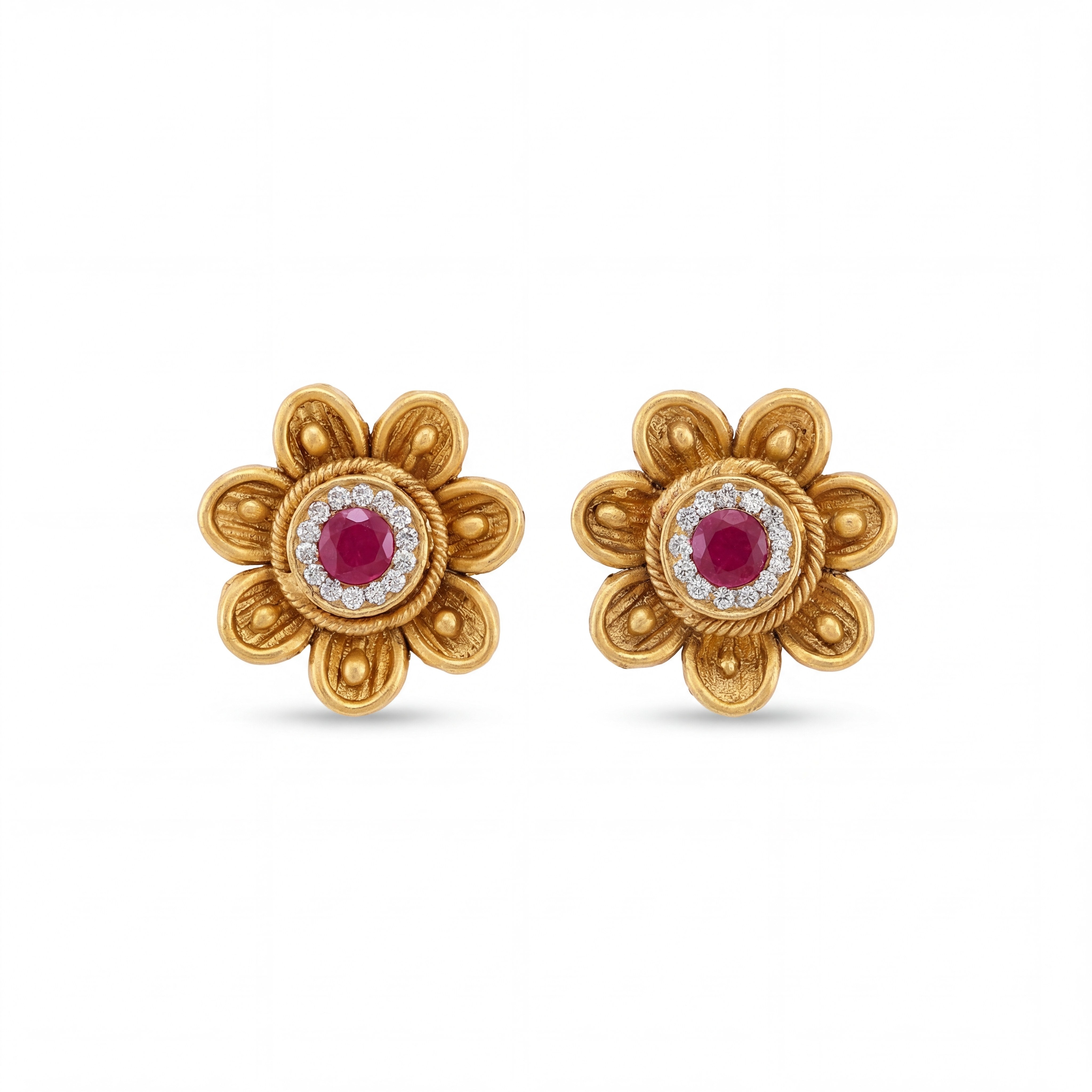 Traditional 22K yellow gold flower shape earrings with red ruby centerpiece and detailed textured petals crafted by Pachchigar Jewellers Ashokbhai