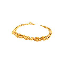 Traditional 22K gold bracelet with decorative filigree beads, intricate patterned accents, and luxurious handcrafted finish designed by Pachchigar Jewellers Ashokbhai.