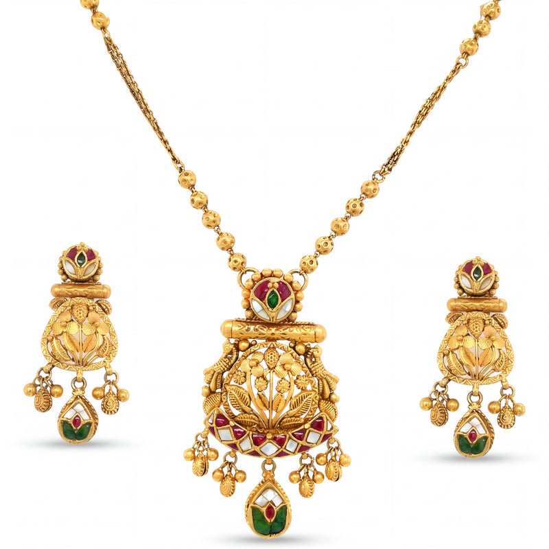 Exquisite 22K yellow gold pendant set featuring intricate heritage temple motifs with red green meenakari detailing, hanging charms, and matching traditional earrings.