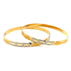 Graceful 22K yellow gold bangles pair featuring textured finish with white rhodium infinity link motifs and delicate sparkling accents in a modern elegant style.