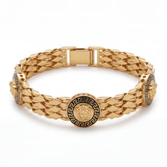Luxurious 22K yellow gold bracelet featuring multi-row woven links with black enamel Medusa-inspired round motifs and secure clasp on a white background by Pachchigar Jewellers Ashokbhai.