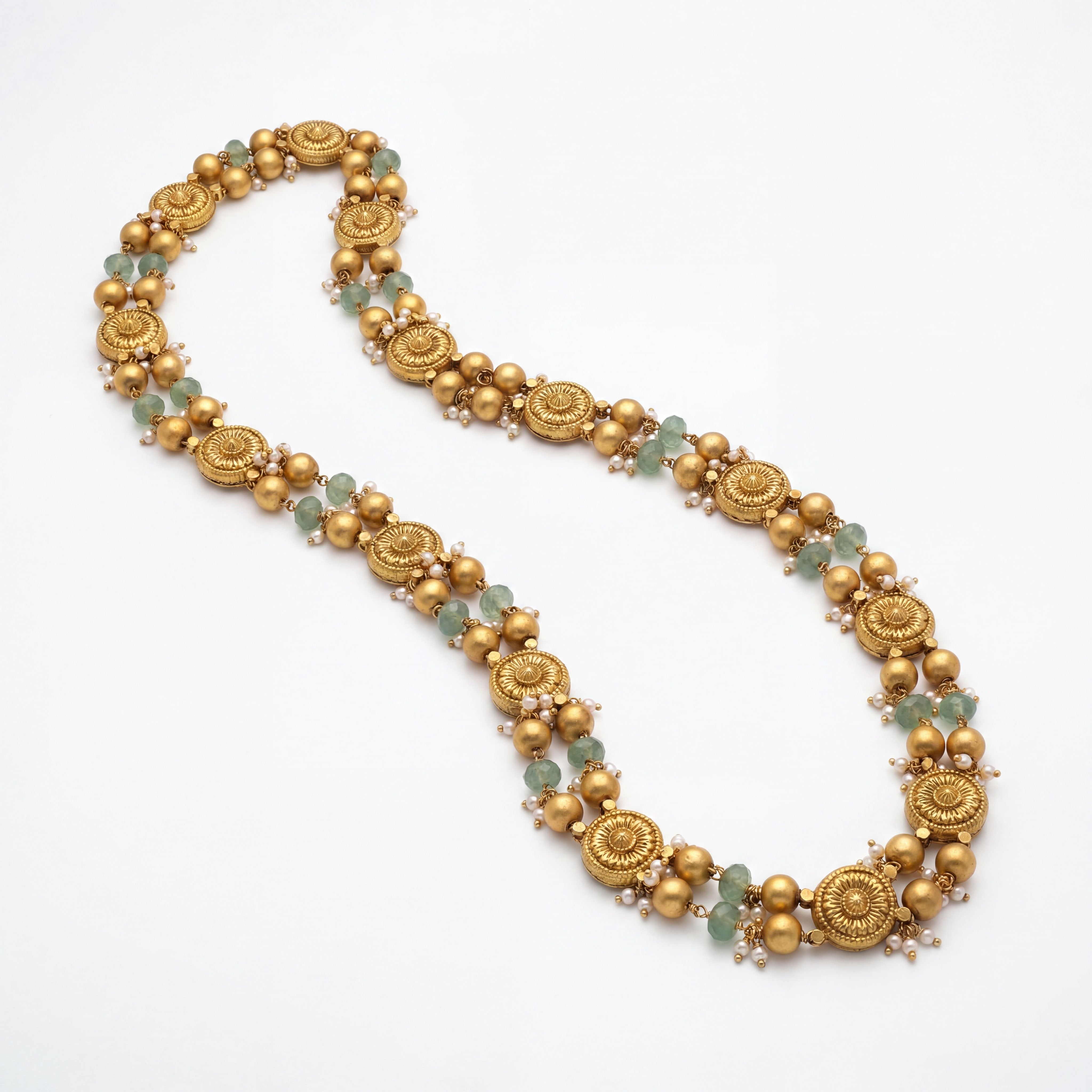 22K gold floral necklace featuring textured gold floral motifs, pastel green gemstone beads, polished gold beads, and delicate pearl accents, crafted for an elegant and timeless traditional look.
