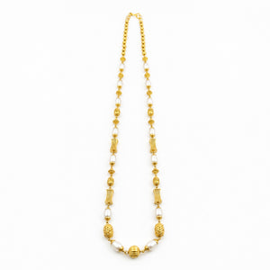 22K gold pearl beaded necklace featuring lustrous white pearls, intricately textured gold beads, decorative barrel-shaped accents, and a polished gold centerpiece, designed for a timeless and elegant traditional look.