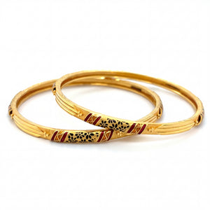 Beautiful 22K yellow gold pair bangles featuring traditional meenakari enamel detailing in red and black floral patterns with elegant textured accents.
