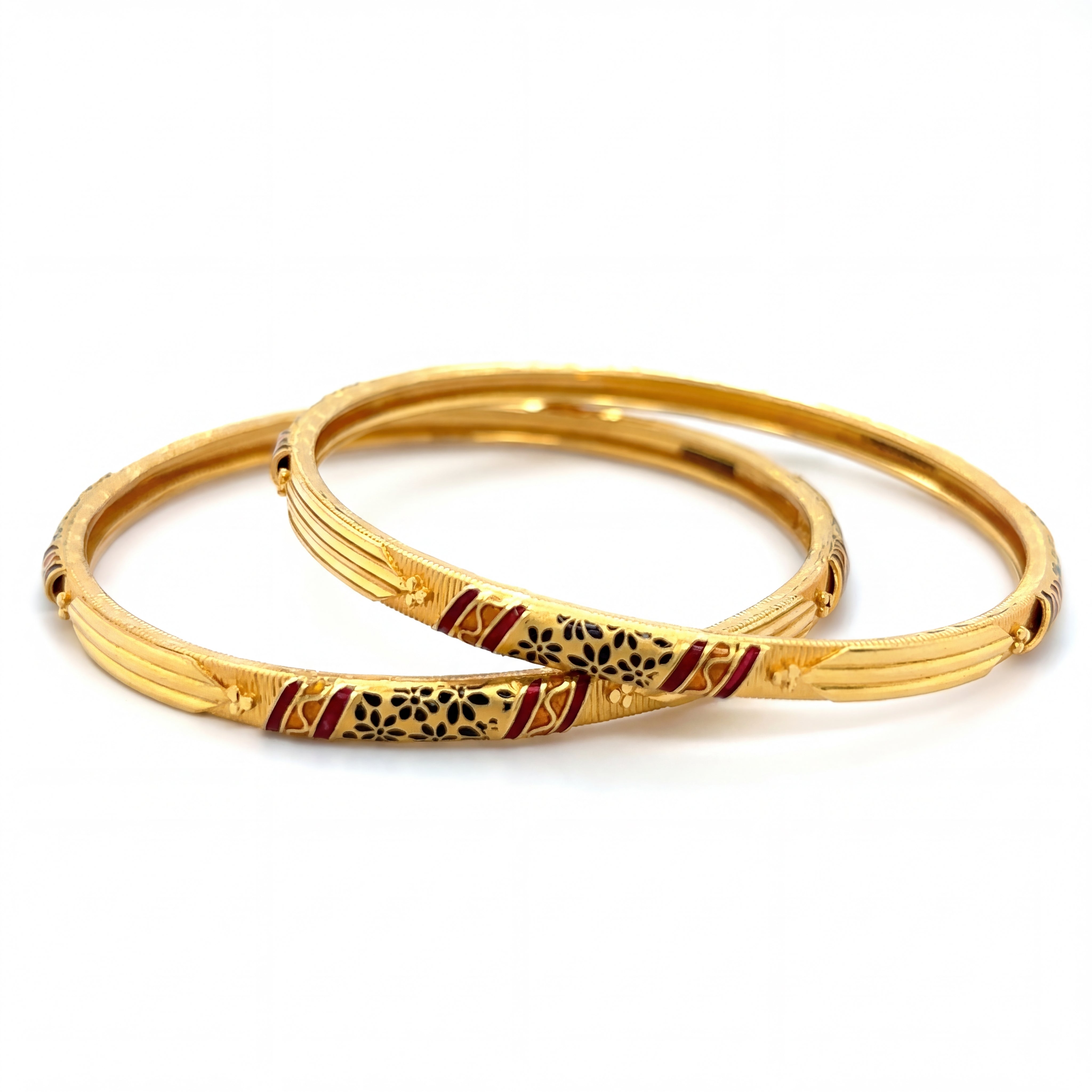 Beautiful 22K yellow gold pair bangles featuring traditional meenakari enamel detailing in red and black floral patterns with elegant textured accents.