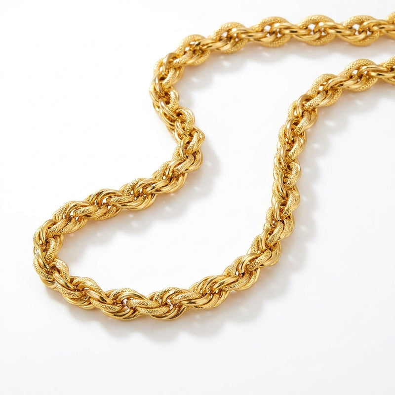 Elegant 22K yellow gold twisted rope link chain necklace featuring textured interwoven links with a luxurious polished finish on a white background.
