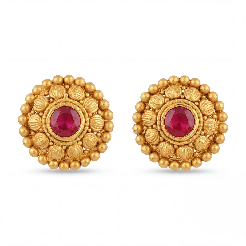 Elegant 22K yellow gold ruby traditional stud earrings featuring round floral design with vibrant red center gemstones by Pachchigar Jewellers Ashokbhai