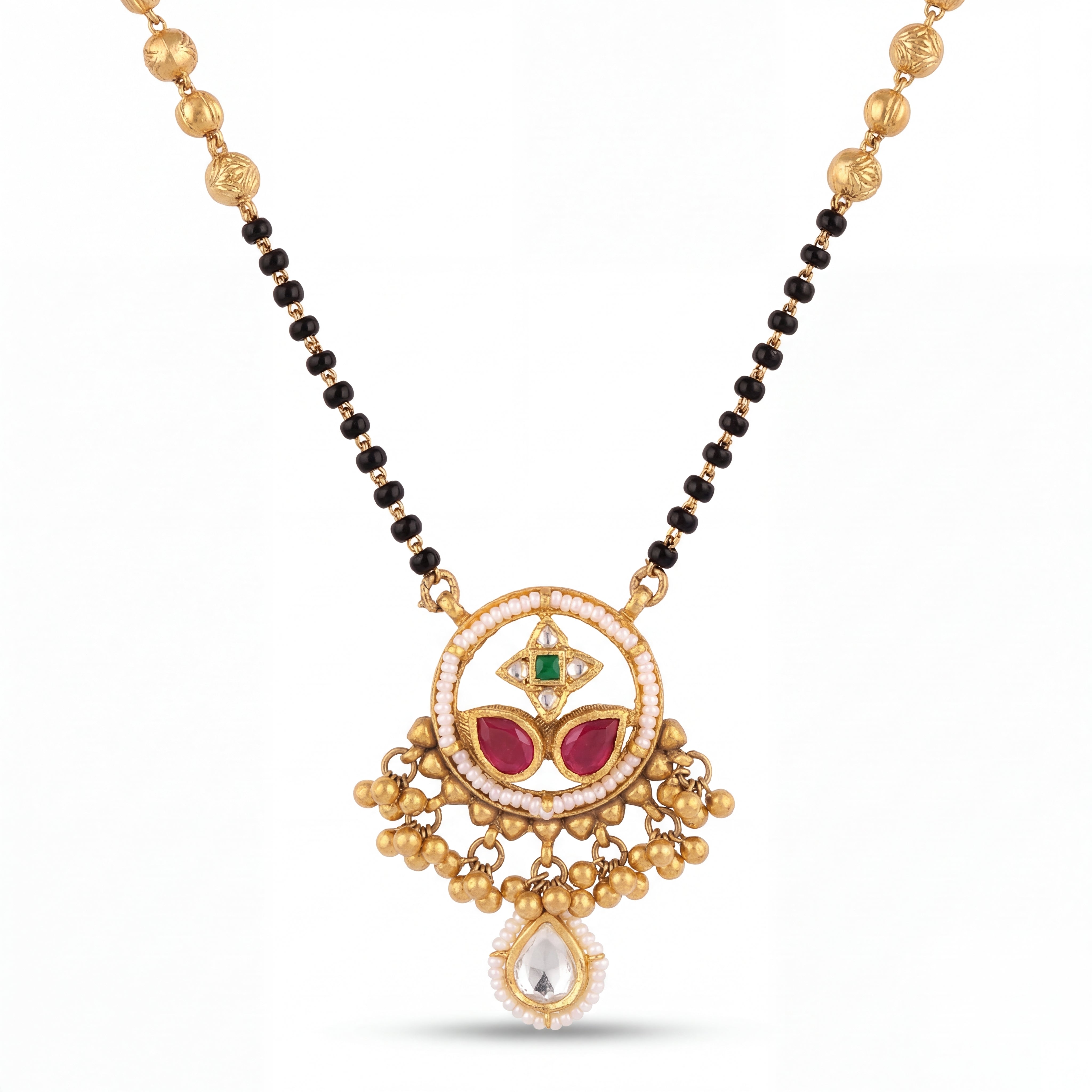 Traditional mangalsutra featuring black bead strands, handcrafted gold chain, designer pendant with ruby, emerald, pearl detailing, dangling gold charms, and festive ethnic styling for bridal and special occasions.