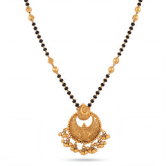 Traditional mangalsutra featuring black beads, handcrafted gold detailing, textured crescent pendant, and dangling gold charms in a timeless ethnic design for bridal and festive wear.