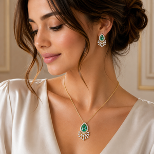 Pear Cut Emerald & Diamond Pendant Set in 18KT Gold