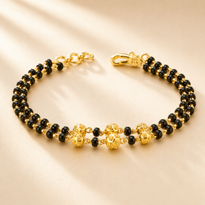 Black Bead Gold Bracelet with Floral Accents