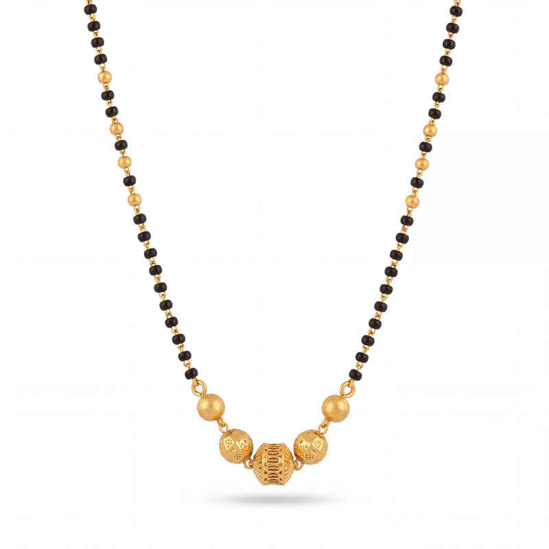 legant gold mangalsutra featuring black bead strands, handcrafted gold bead centerpiece, and timeless traditional design for daily wear and special occasions.