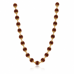 Traditional gold necklace featuring evenly spaced textured Rudraksha beads with delicate gold connectors and ornate bead caps, arranged in an elegant long necklace design.