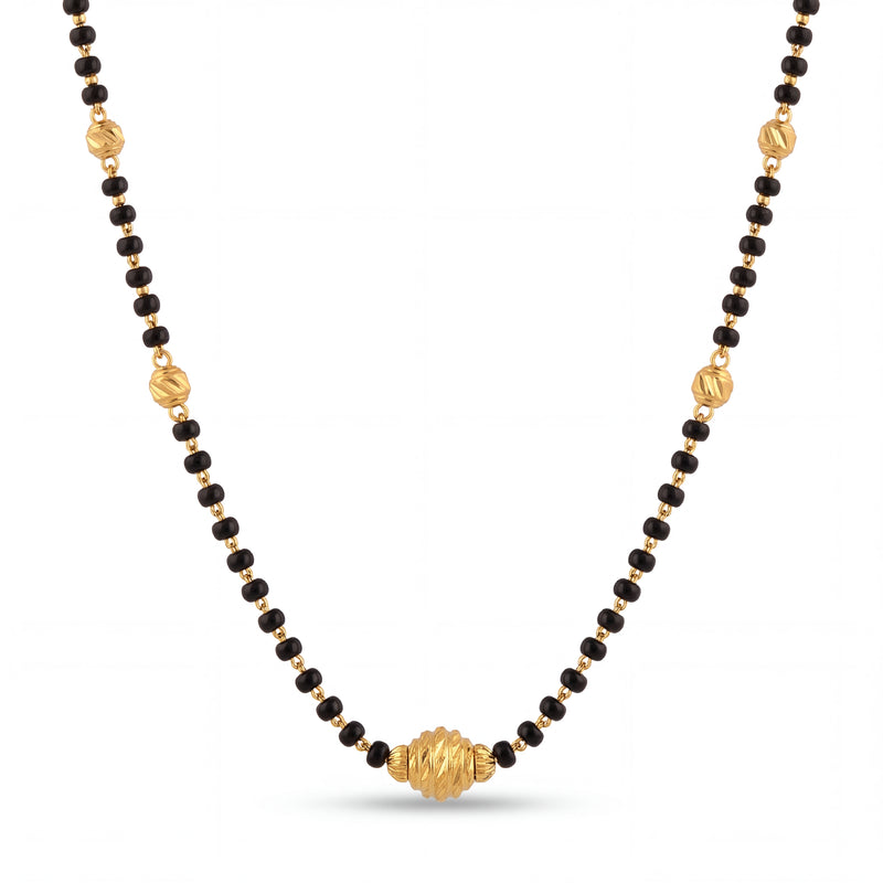 Premium gold mangalsutra with traditional black bead strands, engraved gold center bead pendant, and handcrafted timeless luxury finish by Pachchigar Jewellers Ashokbhai.