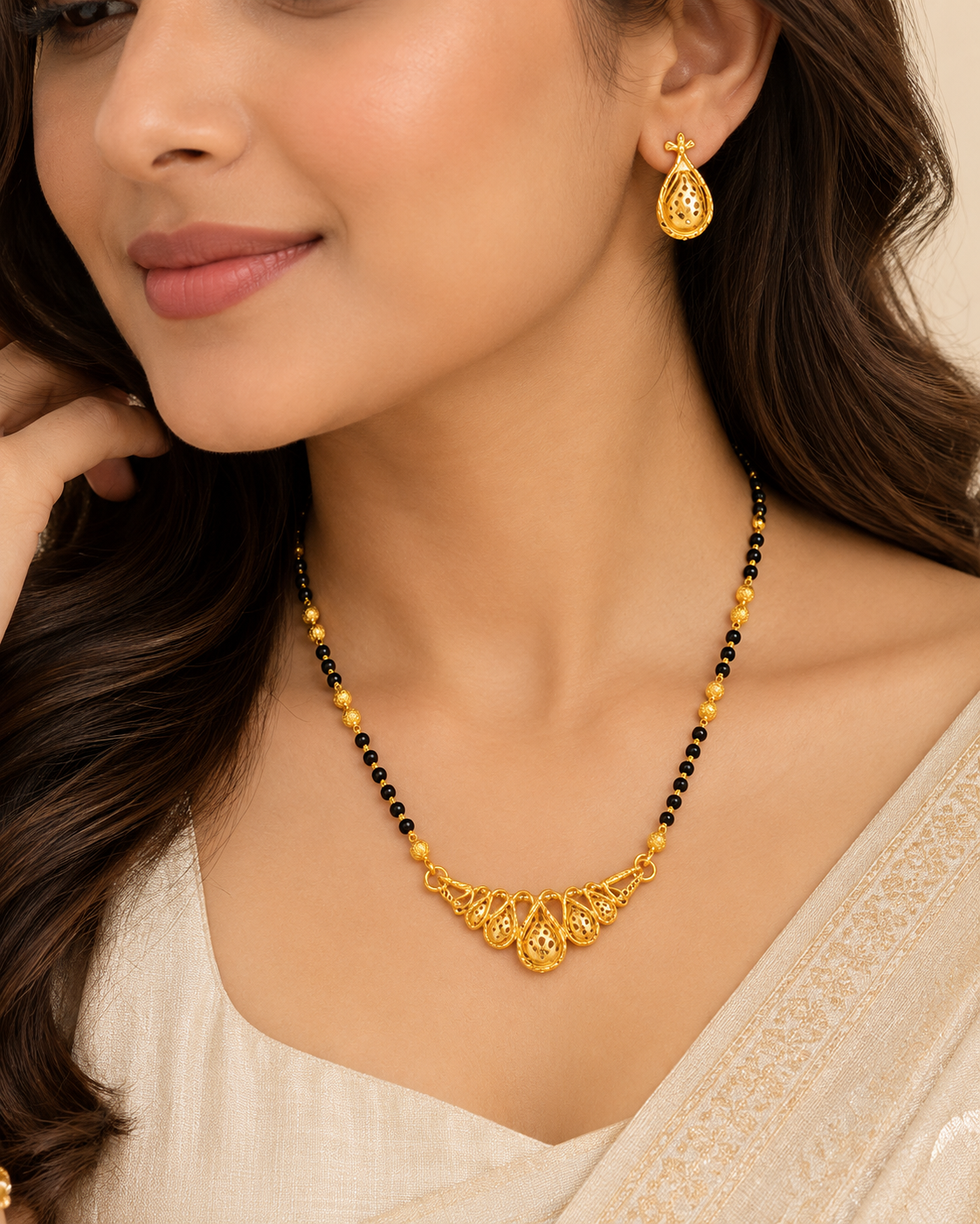 Gold Mangalsutra Set with Paisley Pendant & Black Beads