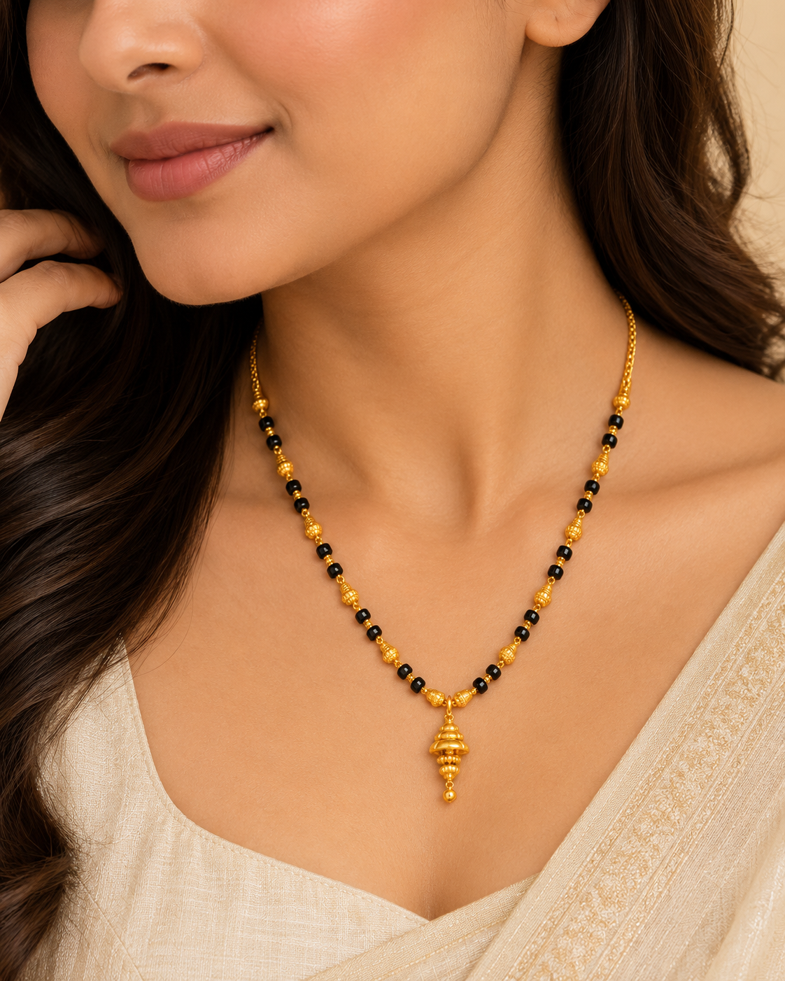 Gold Mangalsutra with Bell-Shaped Pendant & Black Beads