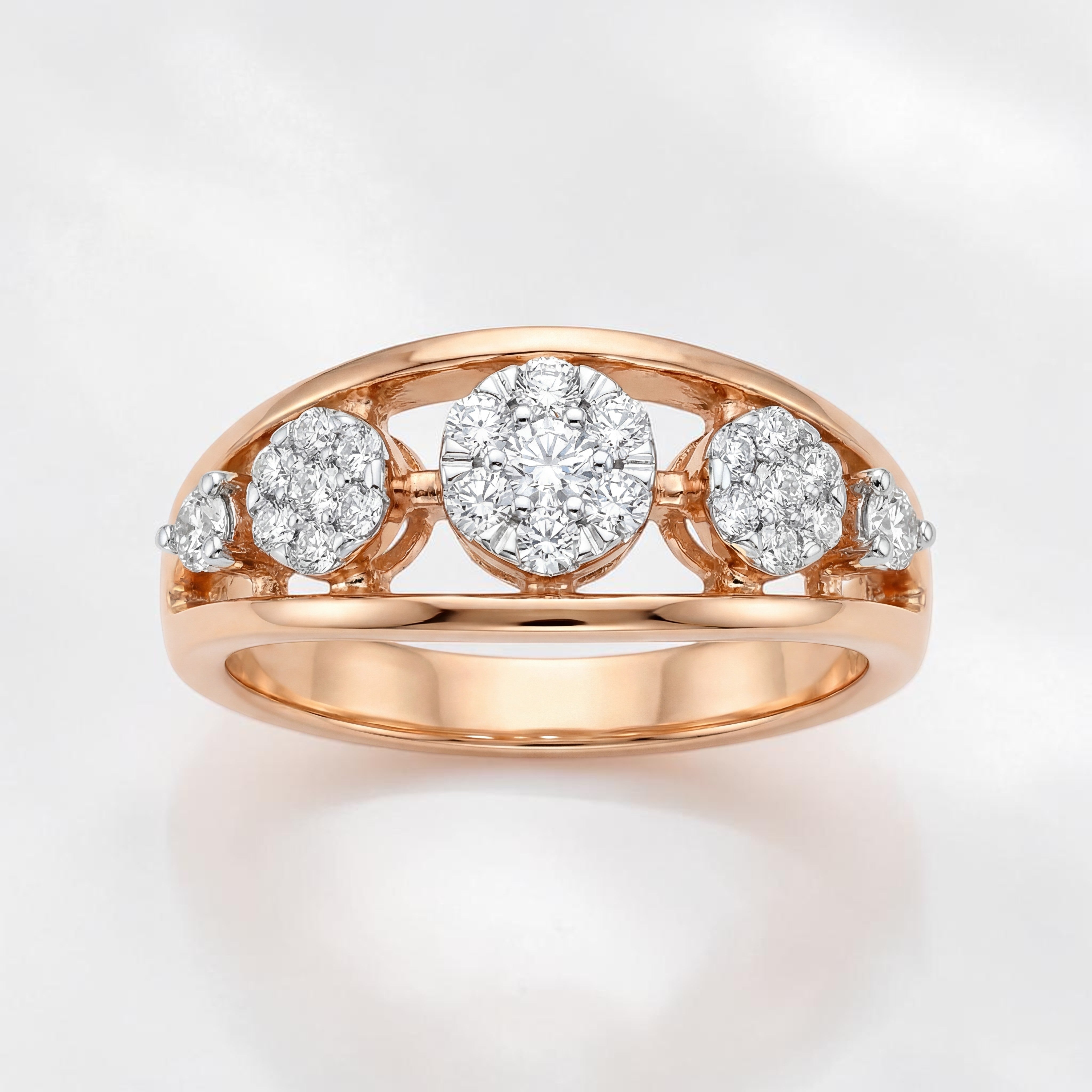 Rose gold ring featuring a central round diamond cluster flanked by two smaller diamond clusters on each side, set in a sleek open gallery design for a refined and timeless look.