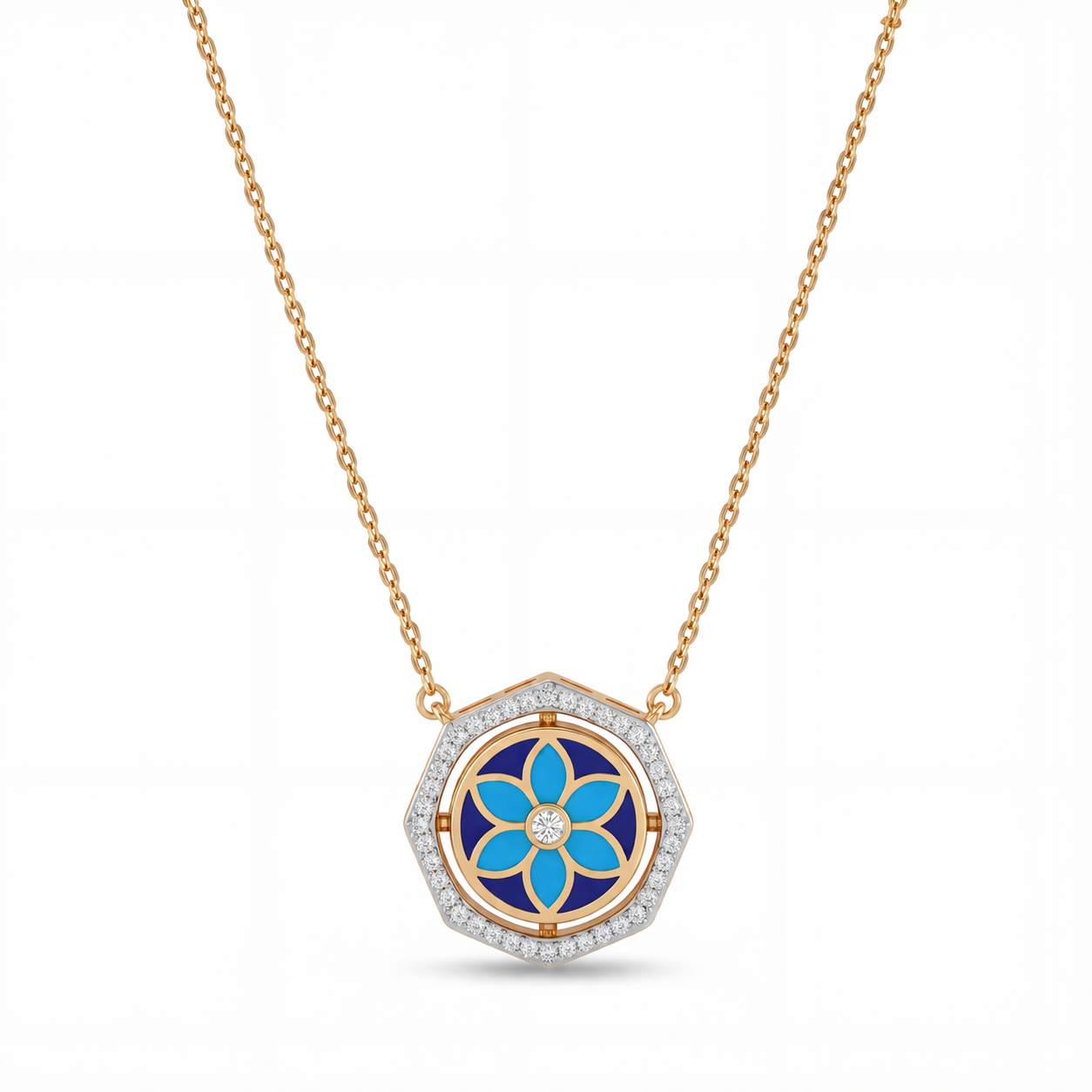 Elegant gold necklace featuring a hexagon-shaped pendant with blue floral enamel detailing and sparkling diamond accents on a white background.