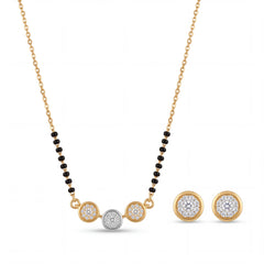 Elegant gold mangalsutra necklace featuring black beads, floral diamond motifs, and matching round diamond stud earrings on a white background.