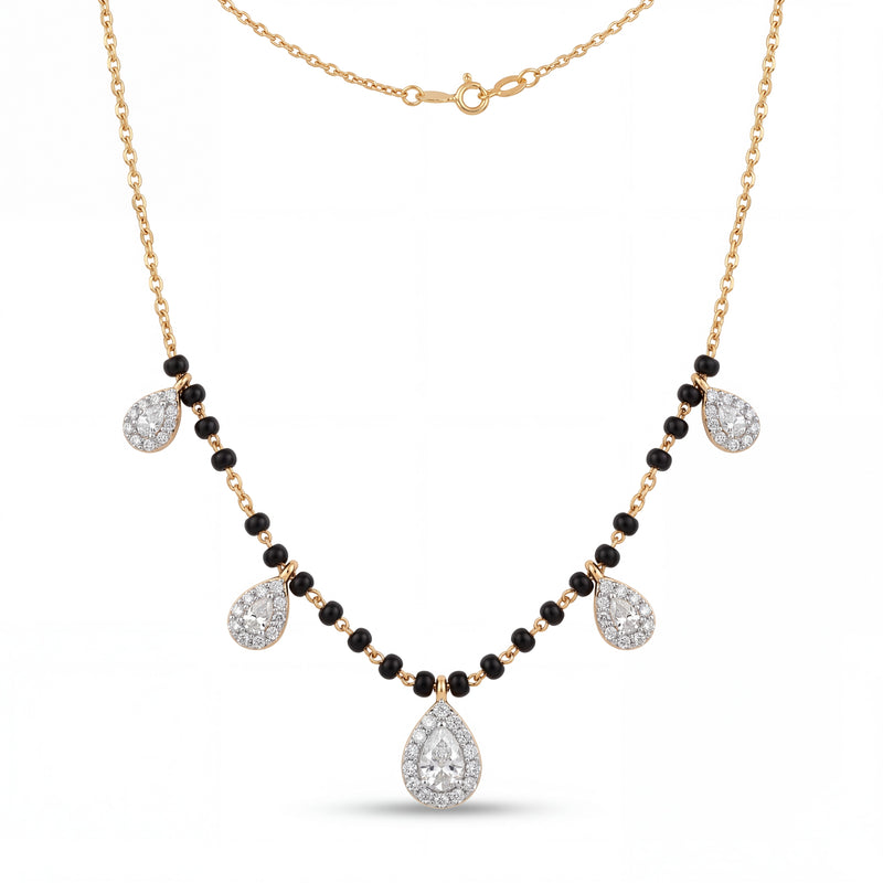 Elegant gold mangalsutra necklace featuring black beads and multiple sparkling teardrop-shaped diamond pendants on a white background.
