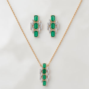 Elegant gold jewelry set featuring emerald-cut green gemstones with sparkling diamond accents in a pendant necklace and matching stud earrings on a white background.