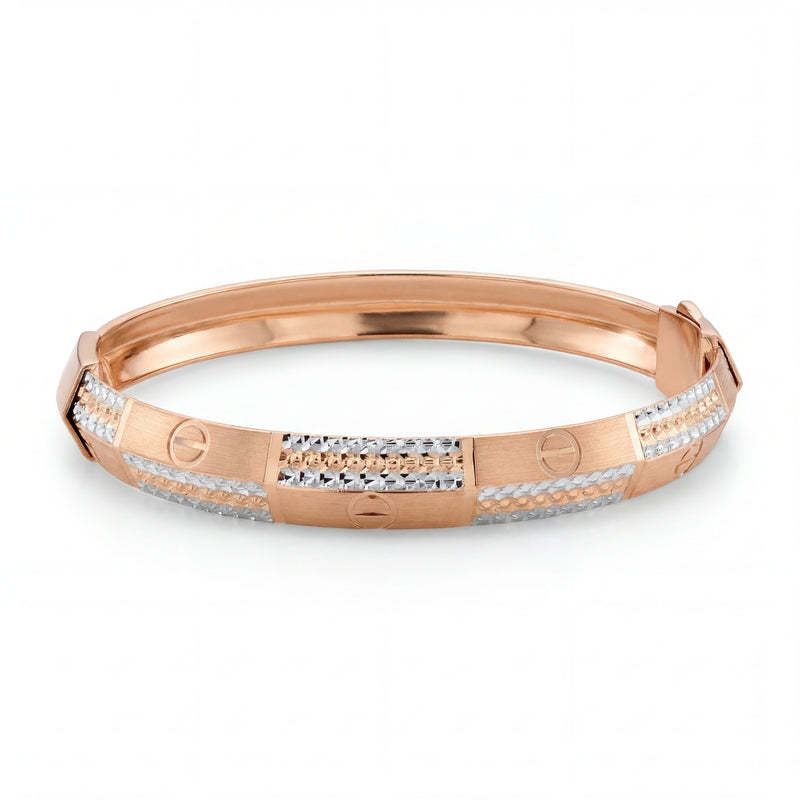 Rose gold kada-style bangle featuring a sleek geometric design with textured gold panels, diamond-accented sections, and screw motif detailing for a contemporary luxury look.