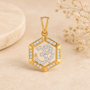 Gold hexagonal pendant featuring a diamond-studded Om symbol at the center, surrounded by a geometric gold frame with diamond accents and a polished gold bail.