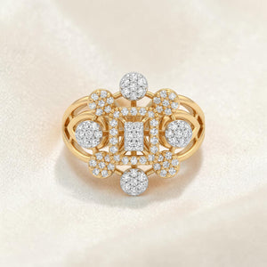 Yellow gold ring featuring a rectangular diamond cluster center surrounded by circular diamond motifs and intricate openwork detailing, creating a bold geometric statement design.