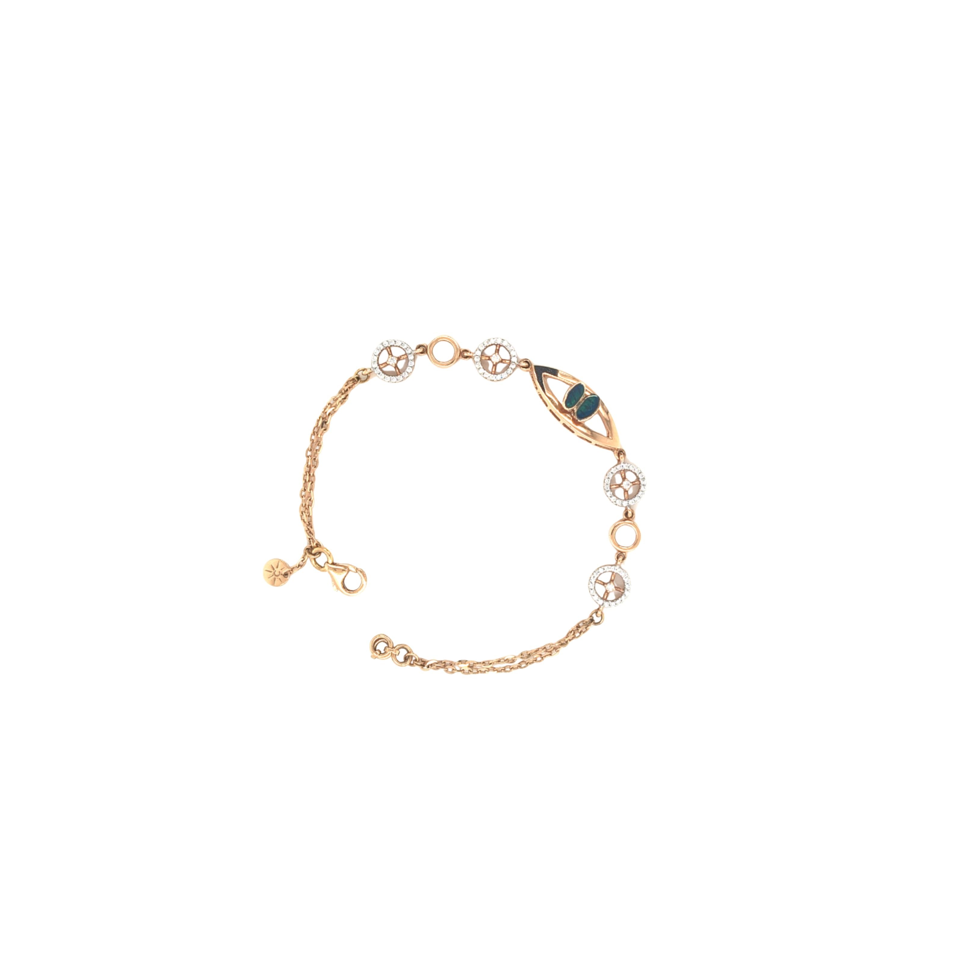 Stylish rose gold bracelet featuring an evil eye centerpiece with blue opal accents and sparkling circular diamond motifs on a delicate chain with adjustable clasp.